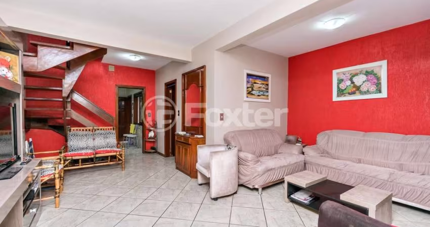 Casa com 4 quartos à venda na Avenida Dante Ângelo Pilla, 112, Costa e Silva, Porto Alegre
