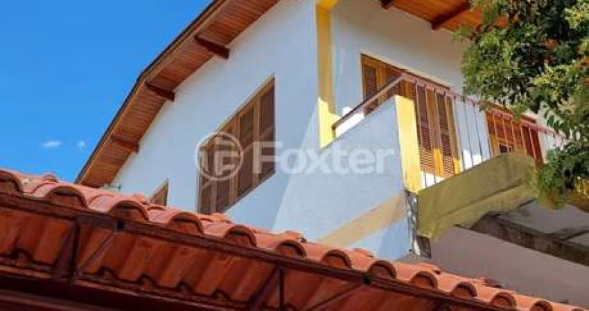 Casa com 5 quartos à venda na Avenida Luiz Moschetti, 190, Vila João Pessoa, Porto Alegre