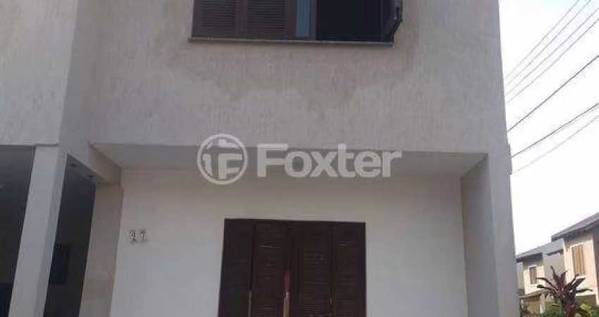 Casa em condomínio fechado com 3 quartos à venda na Rua Ponciano Pacheco da Silveira, 172, Guarujá, Porto Alegre