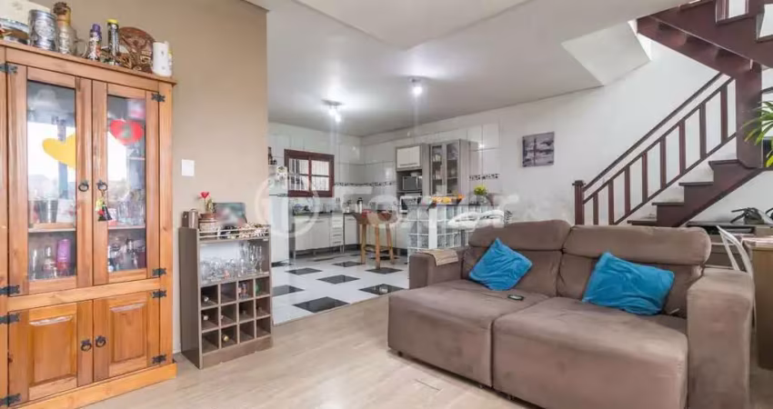 Casa com 6 quartos à venda na Rua Ângelo Passuelo, 330, Vila Nova, Porto Alegre