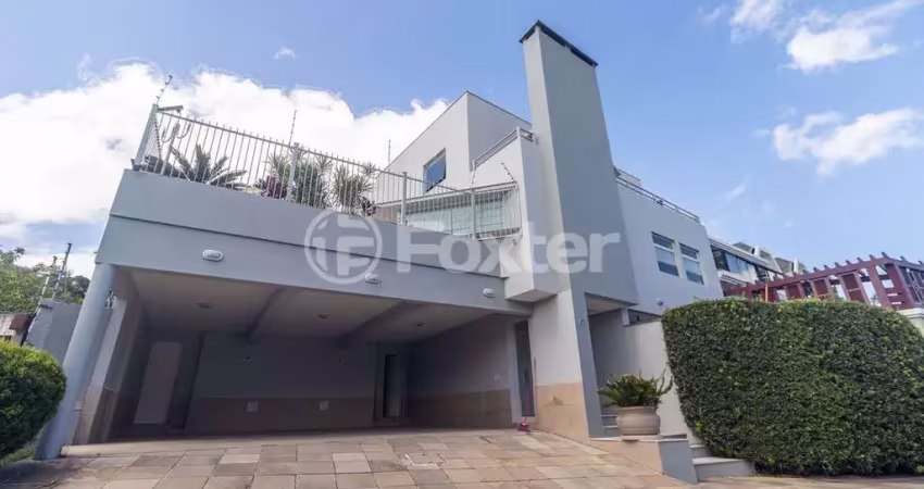 Casa em condomínio fechado com 5 quartos à venda na Rua Alcebíades Antônio dos Santos, 356, Nonoai, Porto Alegre