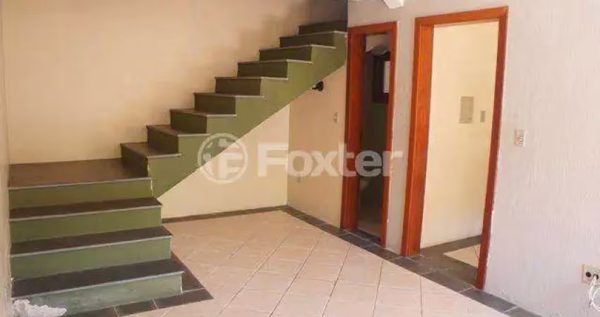 Casa em condomínio fechado com 3 quartos à venda na Rua Padre João Batista Reus, 2475, Camaquã, Porto Alegre