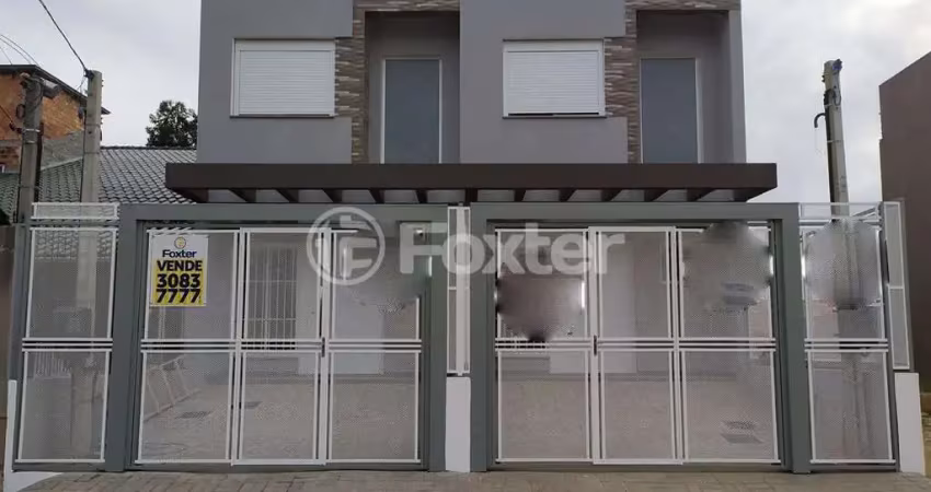 Casa com 3 quartos à venda na Rua Doutor Cláudio Walter Ferreira da Silva, 251, Guarujá, Porto Alegre