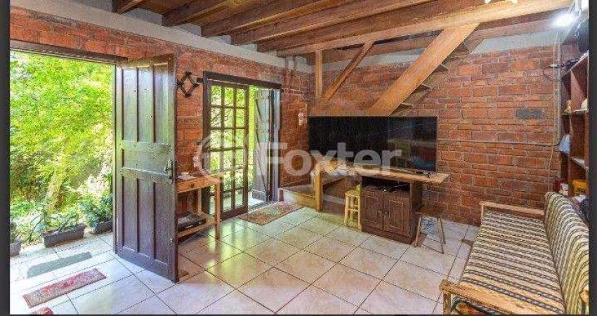 Casa com 4 quartos à venda na Rua Altos da Amapá, 100, Vila Nova, Porto Alegre