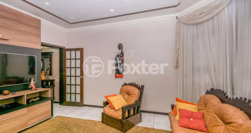 Casa com 3 quartos à venda na Rua Pedro Velho, 724, Partenon, Porto Alegre