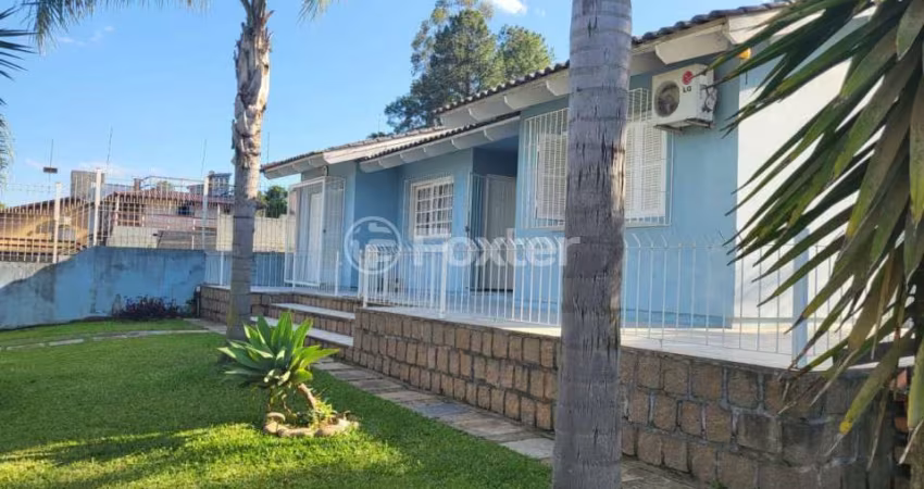 Casa com 4 quartos à venda na Avenida João Carlos Viale Dias, 1347, Tarumã, Viamão