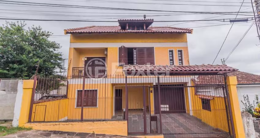 Casa com 4 quartos à venda na Travessa Clemêncio Wallau, 24, Coronel Aparício Borges, Porto Alegre