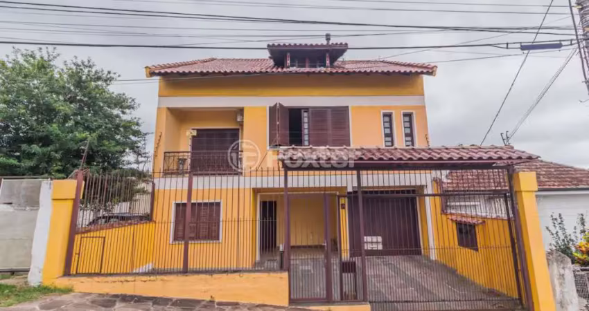Casa com 4 quartos à venda na Travessa Clemêncio Wallau, 24, Coronel Aparício Borges, Porto Alegre