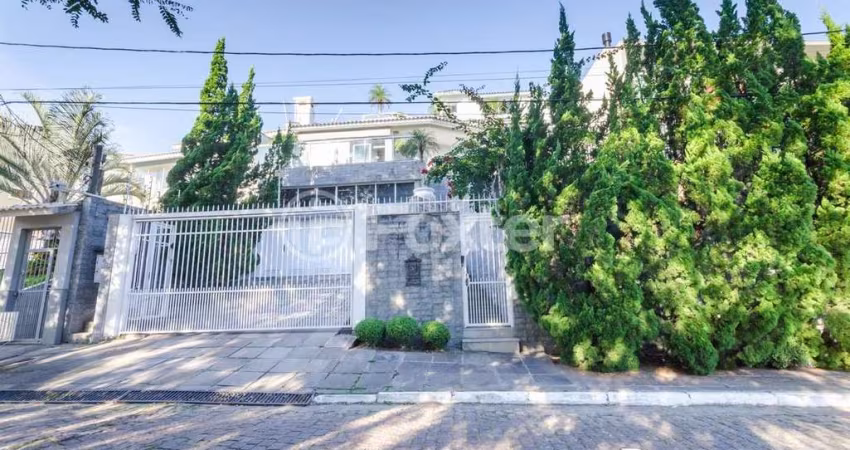 Casa com 3 quartos à venda na Rua Alcebíades Antônio dos Santos, 550, Nonoai, Porto Alegre