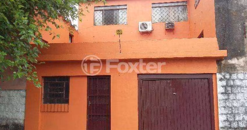Casa com 3 quartos à venda na Rua Atílio Supertti, 990, Vila Nova, Porto Alegre