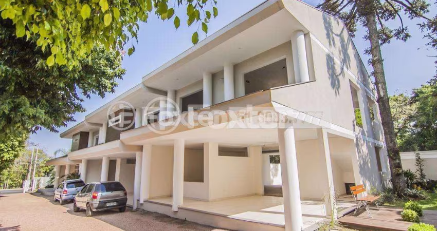 Casa em condomínio fechado com 3 quartos à venda na Avenida Coronel Marcos, 1460, Pedra Redonda, Porto Alegre