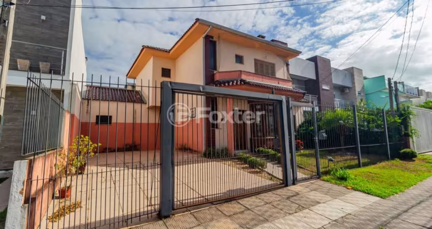 Casa em condomínio fechado com 5 quartos à venda na Rua Eroni Soares Machado, 104, Hípica, Porto Alegre
