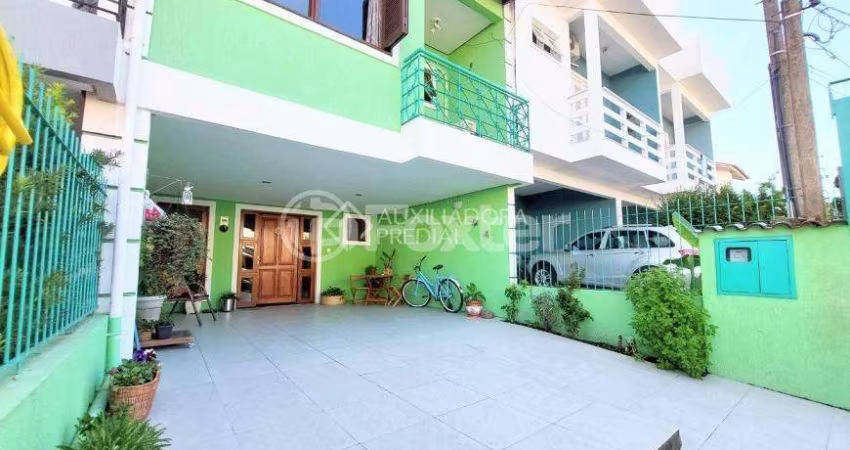 Casa em condomínio fechado com 3 quartos à venda na Rua Pau-Brasil, 549, Hípica, Porto Alegre