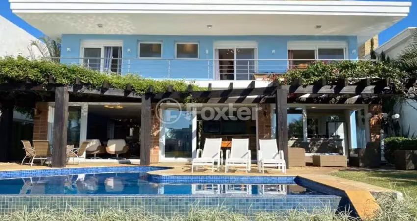 Casa em condomínio fechado com 5 quartos à venda na Avenida Central, 2500, Atlântida, Xangri-Lá