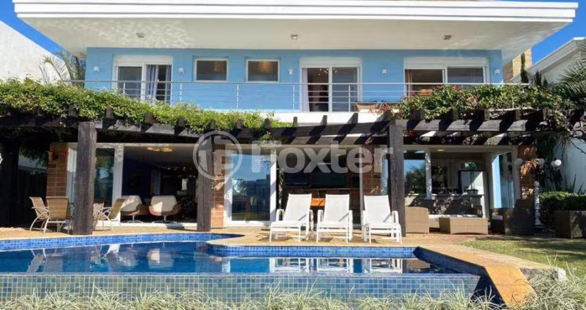 Casa em condomínio fechado com 5 quartos à venda na Avenida Central, 2500, Atlântida, Xangri-Lá