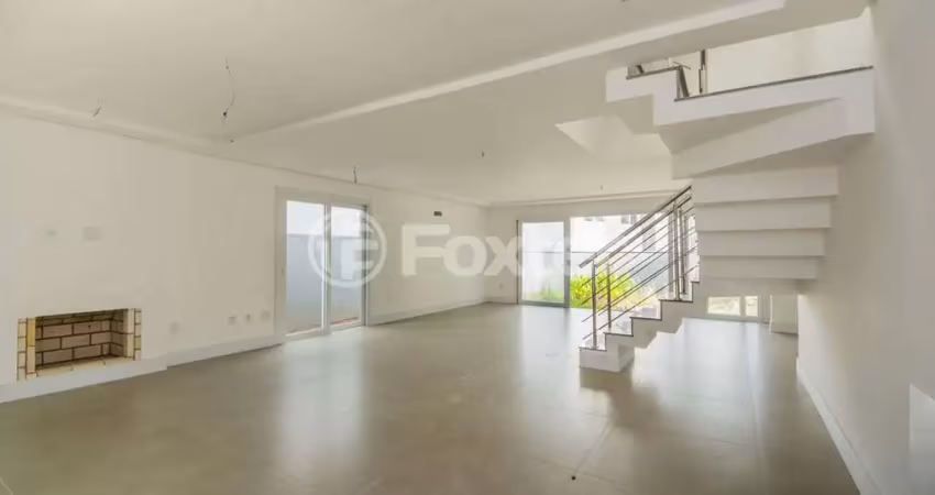 Casa em condomínio fechado com 3 quartos à venda na Avenida Coronel Marcos, 1239, Pedra Redonda, Porto Alegre
