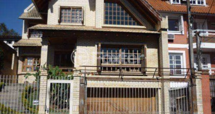 Casa com 3 quartos à venda na Rua Padre João Batista Reus, 629, Vila Conceição, Porto Alegre