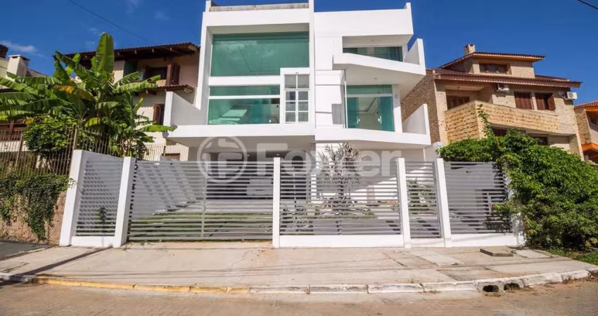 Casa em condomínio fechado com 3 quartos à venda na Rua Alcebíades Antônio dos Santos, 605, Nonoai, Porto Alegre