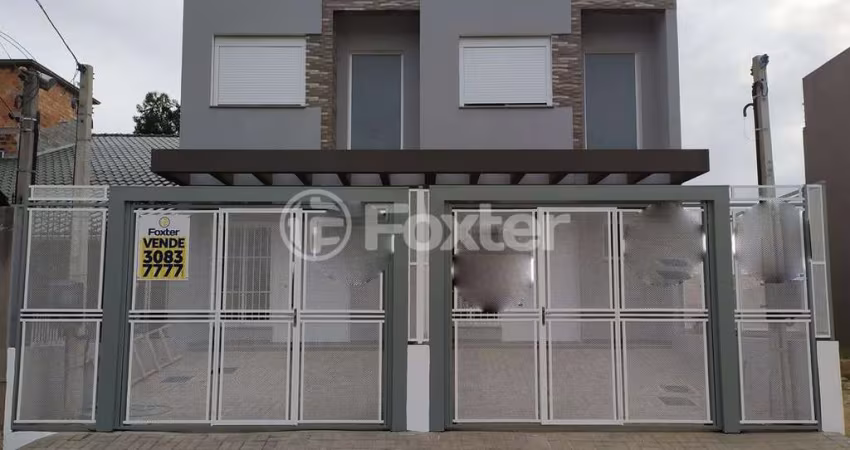 Casa com 3 quartos à venda na Rua Doutor Cláudio Walter Ferreira da Silva, 251, Guarujá, Porto Alegre