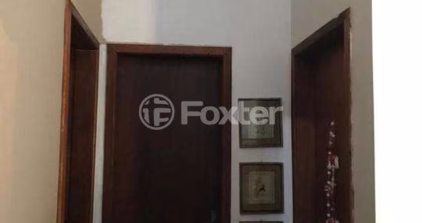 Casa com 3 quartos à venda na Rua Criciúma, 357, Guarujá, Porto Alegre