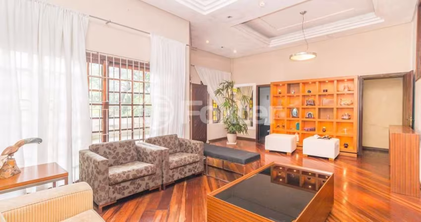 Casa com 4 quartos à venda na Avenida Fábio Araújo Santos, 1472, Nonoai, Porto Alegre