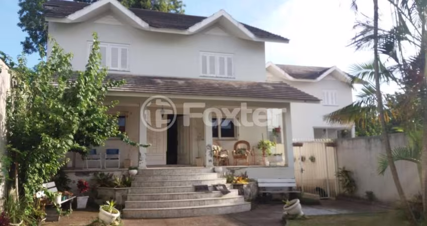 Casa com 4 quartos à venda na Rua Vicente Pacheco, 221, Marechal Rondon, Canoas