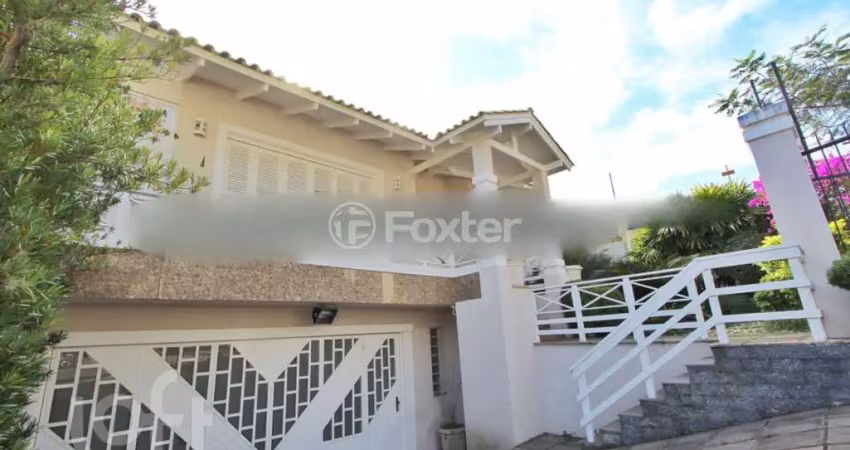 Casa com 5 quartos à venda na Rua Indianápolis, 240, Três Figueiras, Porto Alegre