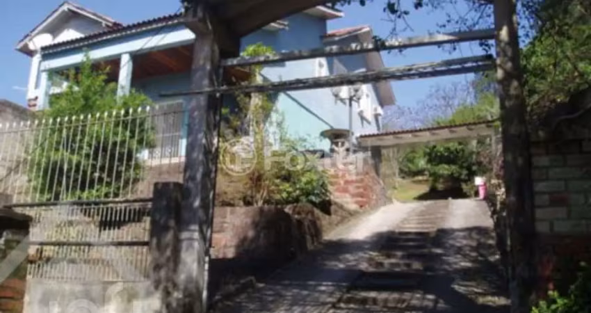 Casa com 4 quartos à venda na Avenida Bento Gonçalves, 9235, Agronomia, Porto Alegre