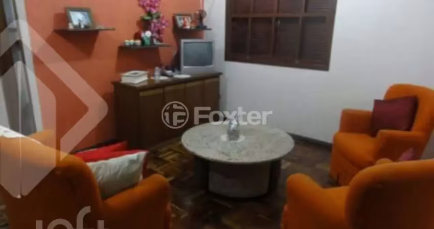 Casa com 5 quartos à venda na Rua Flor de Pessegueiro, 27, Vila Nova, Porto Alegre