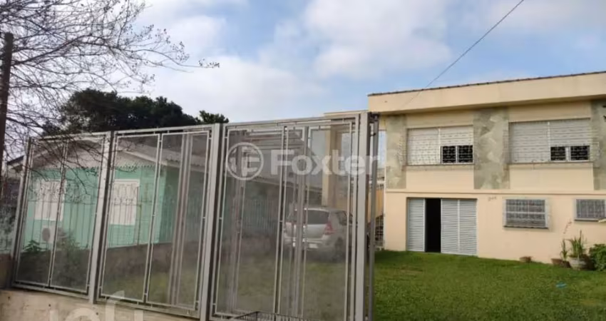 Casa com 3 quartos à venda na Rua Nove de Junho, 244, Vila São José, Porto Alegre