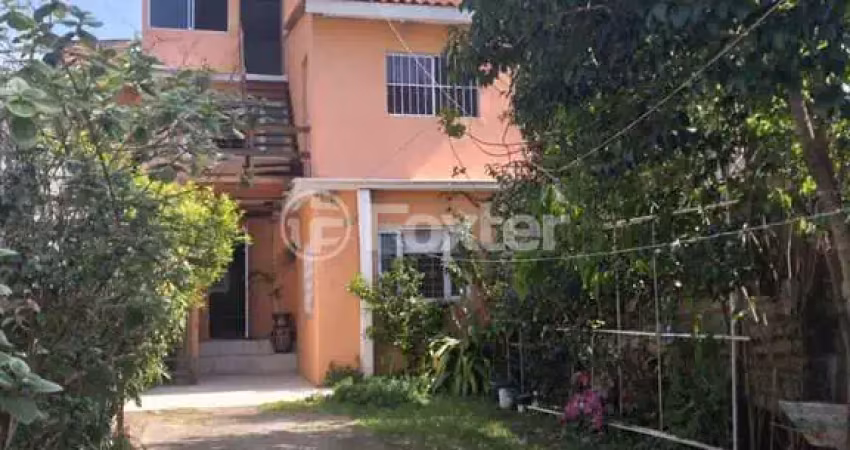 Casa com 4 quartos à venda na Rua Aldrovando Leão, 85, Vila Jardim, Porto Alegre