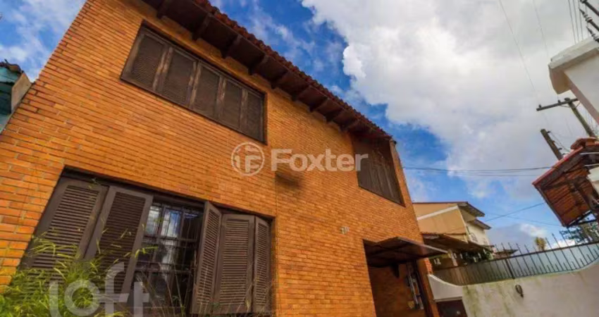 Casa com 4 quartos à venda na Rua Breno Arruda, 105, Santa Maria Goretti, Porto Alegre