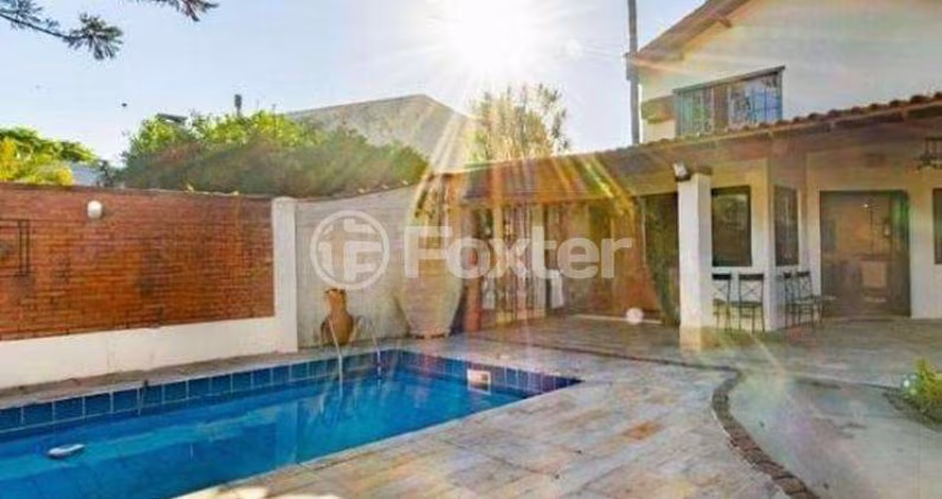 Casa com 4 quartos à venda na Rua Morano Calabro, 76, Jardim Isabel, Porto Alegre