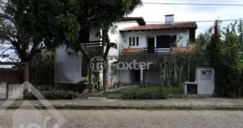 Casa com 4 quartos à venda na Rua Professor Xavier Simões, 253, Sétimo Céu, Porto Alegre