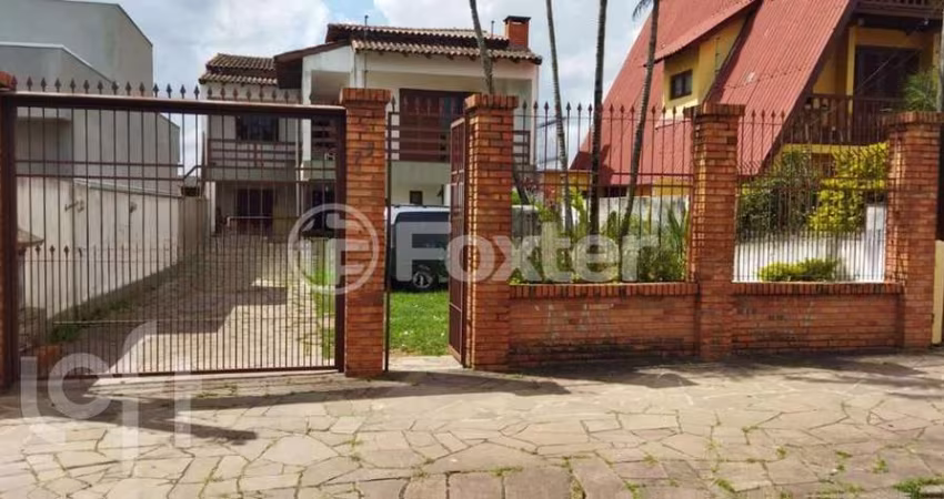 Casa com 7 quartos à venda na Rua General Telino Chagastelles, 75, Parque Santa Fé, Porto Alegre