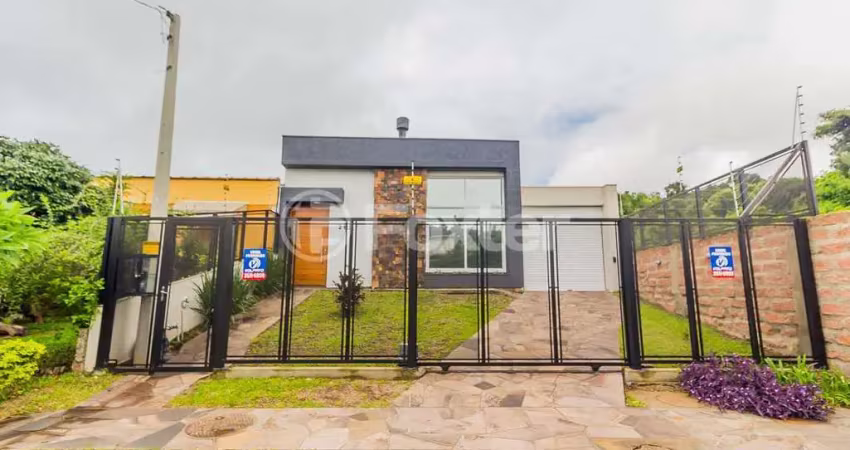 Casa com 3 quartos à venda na Rua Luiz Delfino, 210, Espírito Santo, Porto Alegre