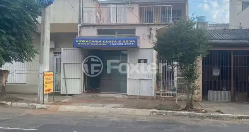 Casa com 5 quartos à venda na Rua Silvestre Félix Rodrigues, 578, Costa e Silva, Porto Alegre