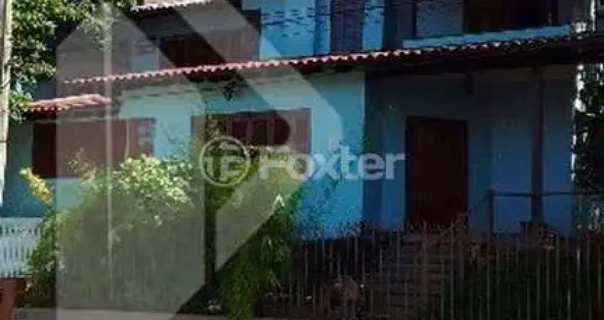 Casa com 3 quartos à venda na Rua Ramis Galvão, 283, Passo da Areia, Porto Alegre