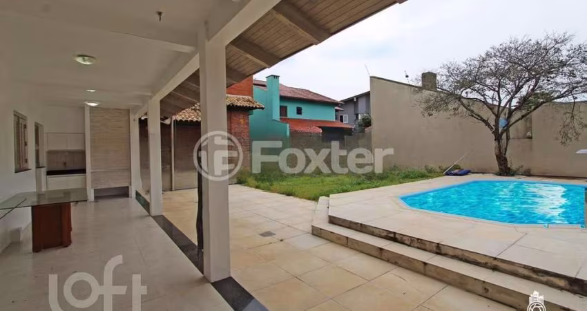 Casa com 4 quartos à venda na Rua Irmão Adão Rui, 401, Marechal Rondon, Canoas
