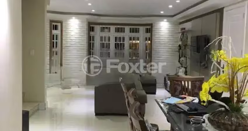 Casa com 4 quartos à venda na Rua Andrômeda, 137, Estância Velha, Canoas