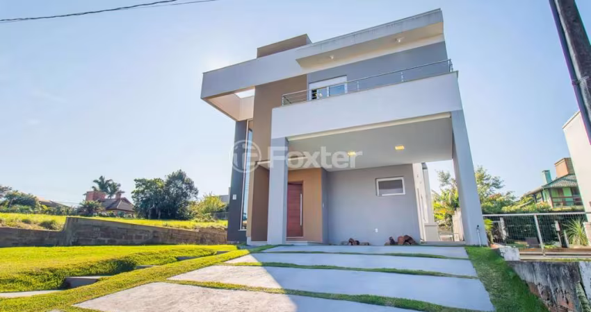 Casa em condomínio fechado com 3 quartos à venda na Rua Capororoca, 28, São Lucas, Viamão
