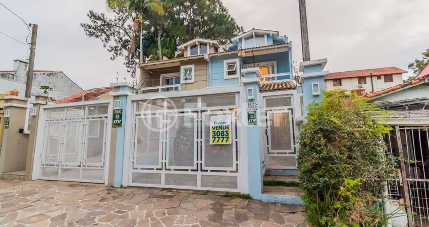 Casa com 4 quartos à venda na Rua Padre João Batista Reus, 1941, Vila Conceição, Porto Alegre