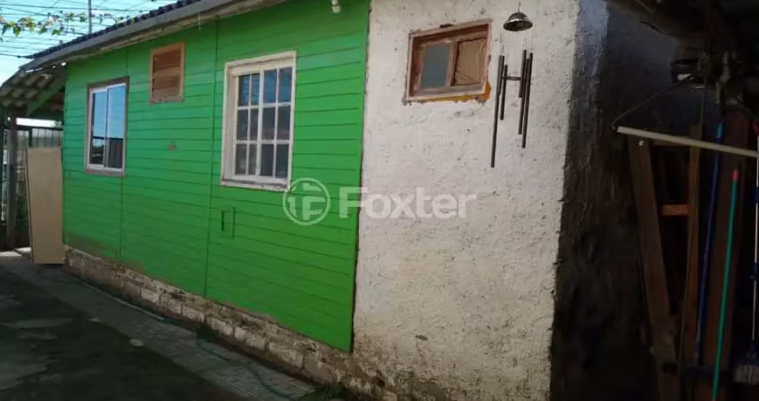 Casa com 3 quartos à venda na Rua Catarino Andreatta, 284, Vila Nova, Porto Alegre