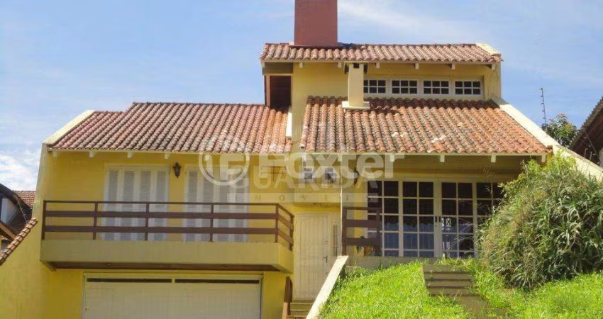 Casa com 3 quartos à venda na Rua Padre João Batista Reus, 2071, Camaquã, Porto Alegre