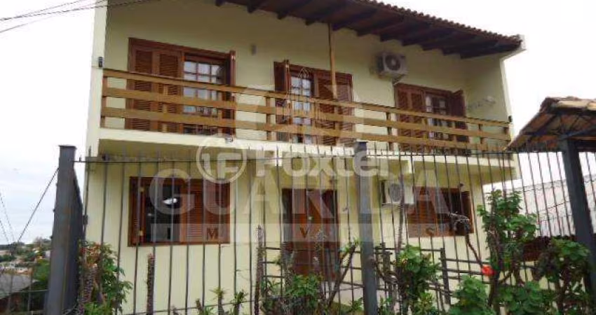 Casa com 3 quartos à venda na Avenida Natal, 241, Medianeira, Porto Alegre