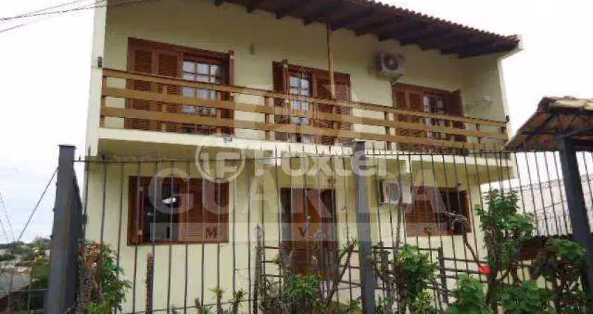 Casa com 3 quartos à venda na Avenida Natal, 241, Medianeira, Porto Alegre