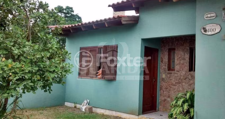 Casa com 3 quartos à venda na Avenida Edgar Pires de Castro, 400, Hípica, Porto Alegre