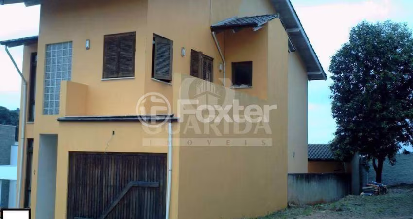 Casa em condomínio fechado com 3 quartos à venda na Avenida Juca Batista, 2705, Cavalhada, Porto Alegre
