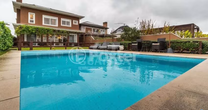 Casa em condomínio fechado com 4 quartos à venda na Avenida Juca Batista, 9000, Belém Novo, Porto Alegre