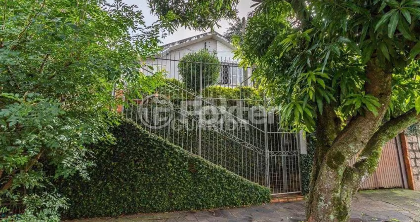 Casa com 3 quartos à venda na Rua Vinte e Um de Agosto, 152, Cavalhada, Porto Alegre